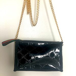 Gucci makeup bag with chain